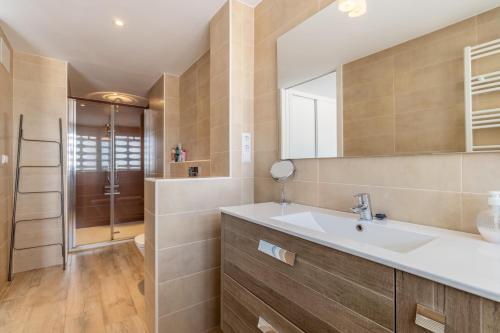 a bathroom with a sink and a shower at Top first line apartment Altea in Altea