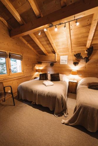 Llit o llits en una habitació de Chalet Bachal