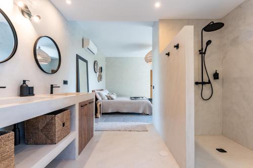 a bathroom with a sink and a shower at Casa Rocas in Mijas