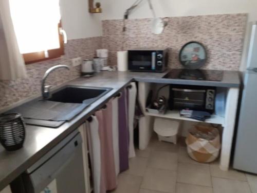 Dapur atau dapur kecil di Maison - Le Rubato