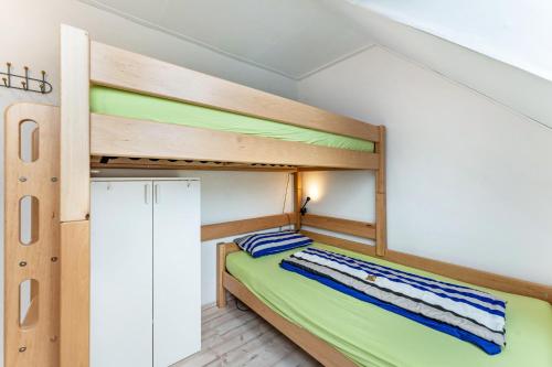 a bunk bed room with two bunk beds at Haus Kasberger in Ascheberg