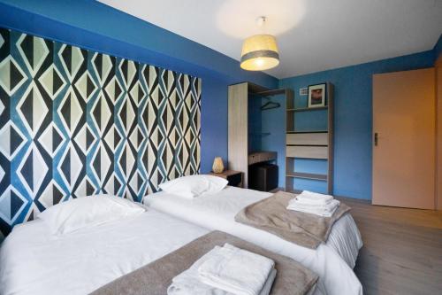 Llit o llits en una habitació de Chez Anna