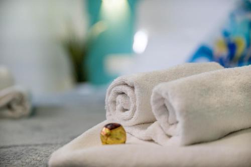 a towel with a piece of food sticking out of it at Ferienwohnung Edelstein in Neukirchen am Großvenediger