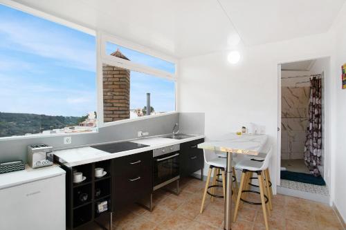 a kitchen with a sink and a window at Carmelo y Carmela 6 in Teror
