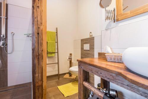 a bathroom with a sink and a toilet at Ferienwohnung Stub´n in Freyung