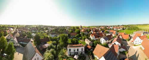 an overhead view of a town with houses and trees at Gästehaus 26 I 2 in Bad Urach
