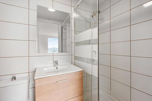 a bathroom with a sink and a mirror at Casa Rural Salrima in Alora