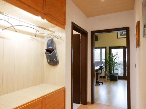 a skateboard hanging on the wall of a kitchen at Ferienwohnung Eva Maria in Mahlberg