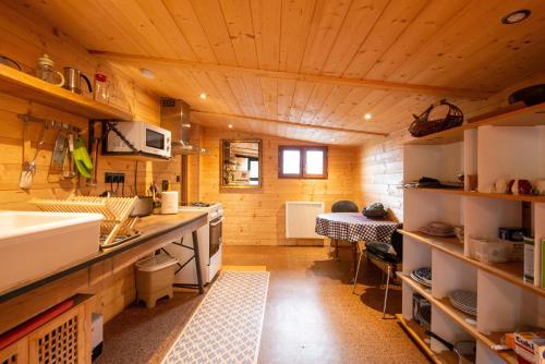 a kitchen with a sink and a counter top at Eco Chalet - Terrasses et sauna in Sospel