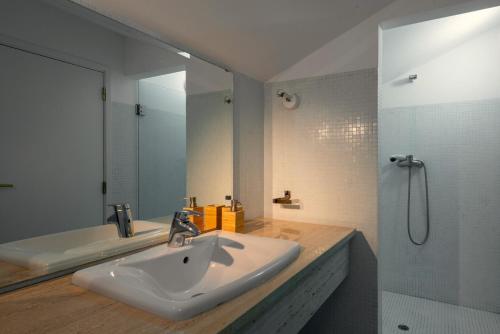 a bathroom with a sink and a mirror at Afife Sea and Mountain Retreat in Afife