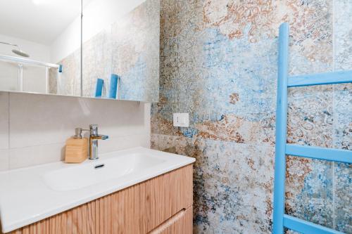 a bathroom with a sink and a shower at Casa Ninì in Galatone