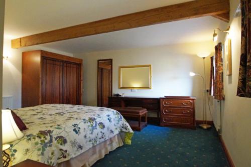 Postel nebo postele na pokoji v ubytování Ty Uchaf