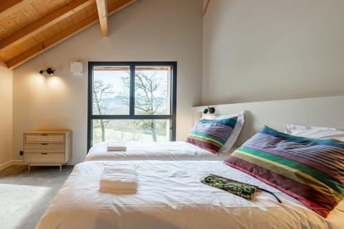 Llit o llits en una habitació de Chalet Rossanaz