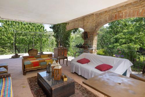 a living room with a couch and a table at Locanda Casa Bardacchino in Mango