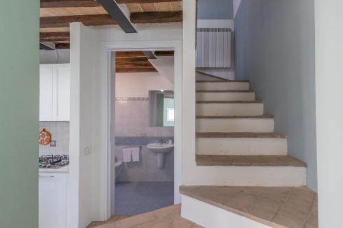 a staircase leading to a bathroom in a house at Lecasedicatia in Villamagna
