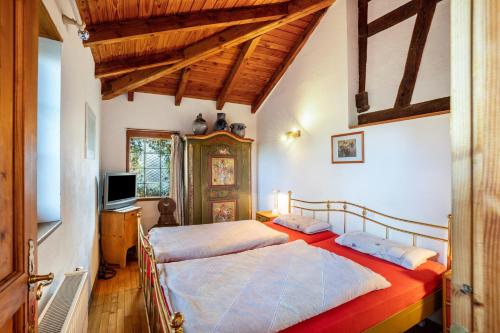 Postel nebo postele na pokoji v ubytování Maison Fleurie