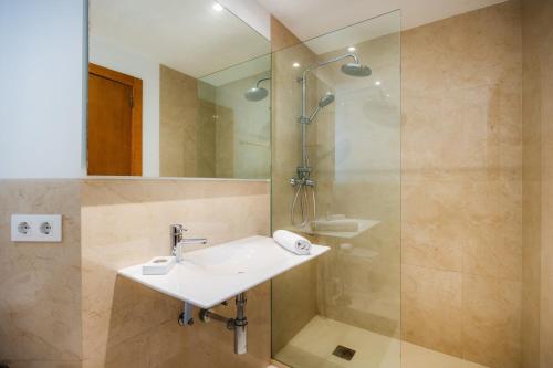 a bathroom with a sink and a shower at Catalina 2b tres dormitorios in Port de Pollensa