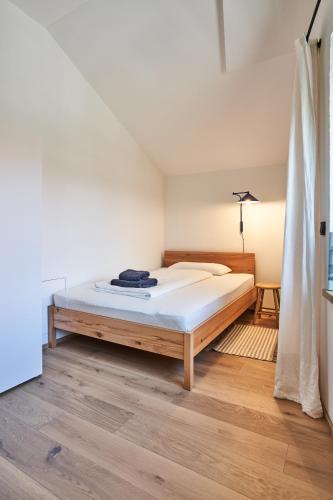 a bedroom with a bed in a room at Alte Seifensiederei - Astrid in Bad Tölz