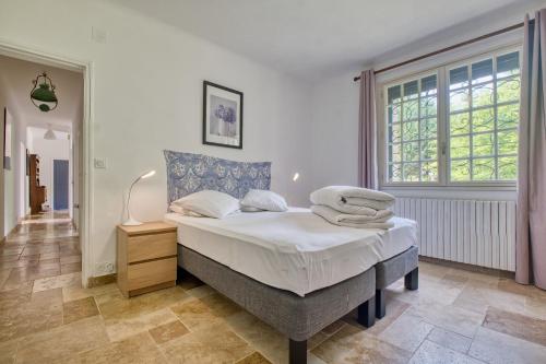 Krevet ili kreveti u jedinici u okviru objekta Maison Le Cayre