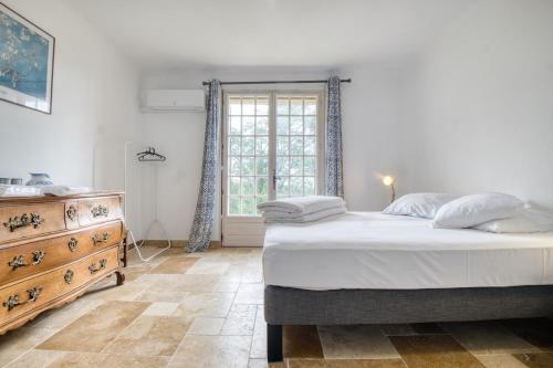 Krevet ili kreveti u jedinici u okviru objekta Maison Le Cayre
