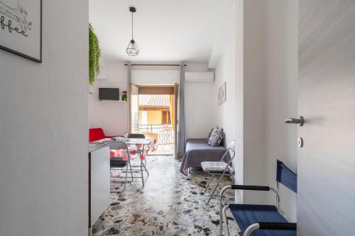 a living room with a table and chairs at Jerzu Centro in Jerzu