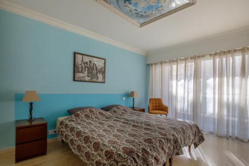 Llit o llits en una habitació de Le Nostalgique
