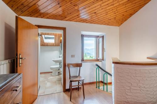 a bathroom with a sink and a toilet in a room at Casa Mary in Prataccio