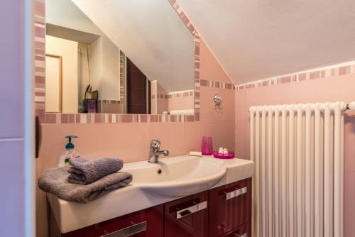 a bathroom with a sink and a mirror at Casa Sicina Alberto in Valfloriana