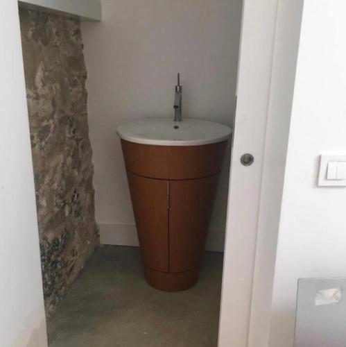 a bathroom with a sink in a room at Casa da Granja in Sobral de Monte Agraço