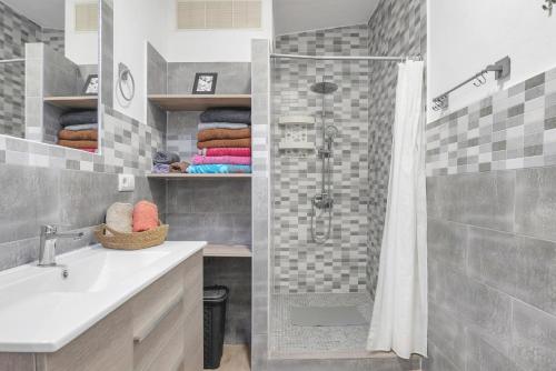 a bathroom with a shower and a sink and a shower at Loft Rural in El Soto