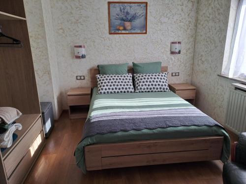 a bedroom with a bed in a room at Maison Maurer in Aschbach