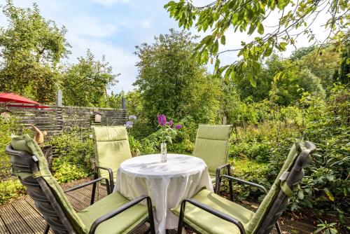 a table and chairs sitting on a patio at Ferienwohnung Rabus in Bisingen