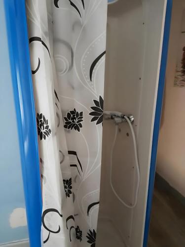 a pair of surfboards standing next to each other at La Maison Defanny - 1 in Muides-sur-Loire