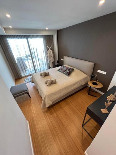 a bedroom with a large bed in a room at Blue infinity 7 in Cumbre del Sol