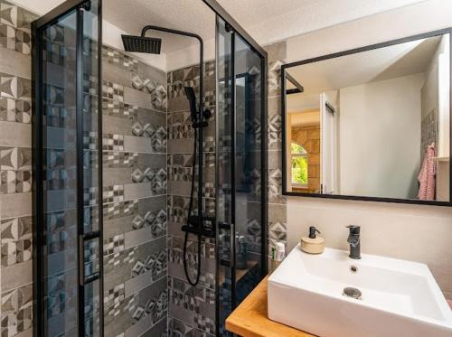 a bathroom with a sink and a shower at Stone oasis Marin in Žrnovo