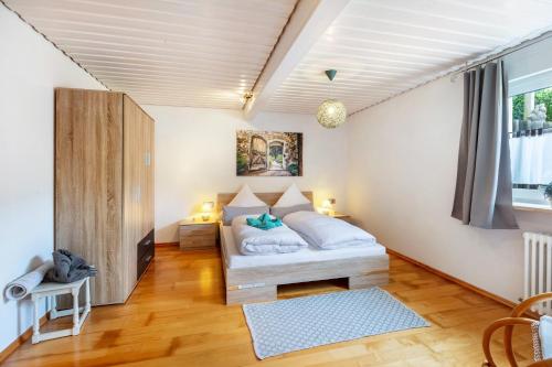 a bedroom with a bed in a room at Haus Strohmeier in Brandenberg