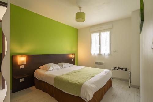 Llit o llits en una habitació de La Tremblade