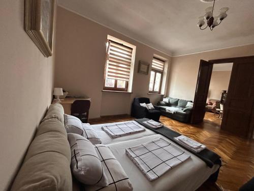 a living room with a couch and a table at Harmonija26 in Karlovac