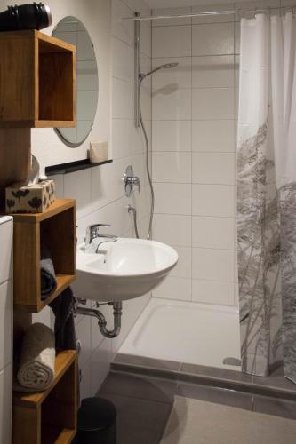 a bathroom with a sink and a shower at Ferienwohnung Auszeit in Salem