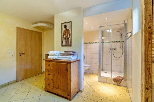 a bathroom with a shower and a sink at Im Rosengarten in Zell am Harmersbach