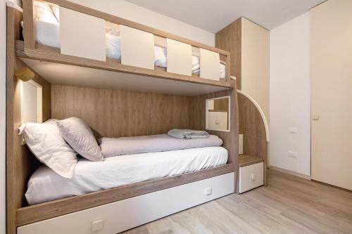 a bedroom with two bunk beds in a room at A Casa Mia Prada vacanza di relax in Prada