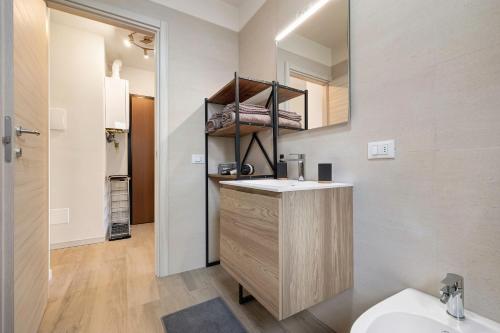 a bathroom with a sink and a mirror at A Casa Mia Prada vacanza di relax in Prada