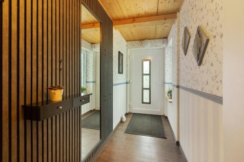 a hallway with a door leading into a room at Ferienwohnung Haus Luise in Olsberg