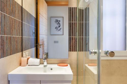a bathroom with a sink and a shower at Golf And Sun in Los Alcázares