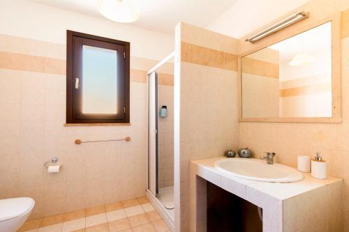 a bathroom with a sink and a mirror at Casa Manuela in Lecce