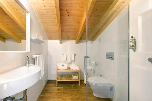 a bathroom with a sink and a toilet at Bartolomeu Cottage - Portimão in Portimão