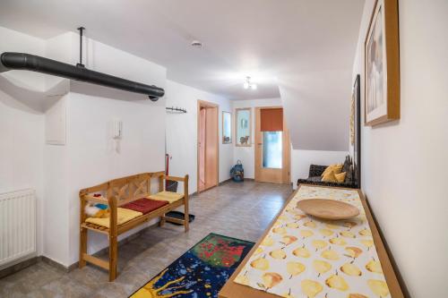 a living room with a bed and a couch at Haus Moritz in Heimenkirch