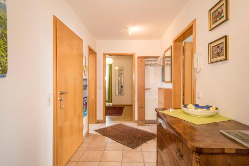 a bathroom with a counter with a bowl on it at Ferienwohnung Haidle in Eriskirch