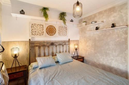 a bedroom with a bed with two pillows on it at Vista Roja in San Agustin