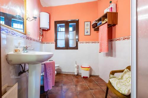a bathroom with a sink and a toilet at Moli d' en Pi in Morella